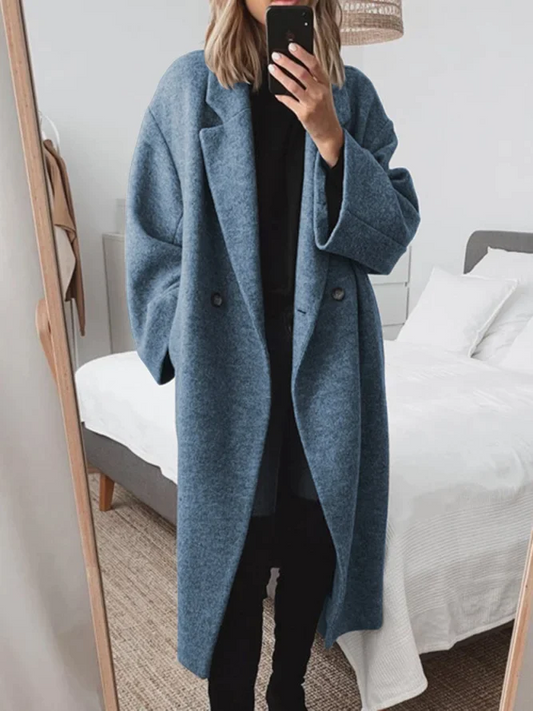 En Oversized Lang Frakke med Sænket Skulder